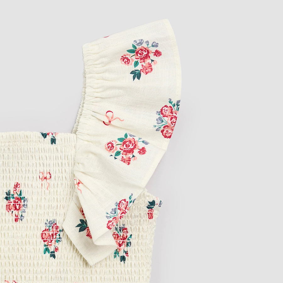 Bows and Bouquets on Ivory Smocked Ruffled Top